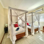 Twin bedroom at Peri Peri Dive Camp in Morrungulo, Mozambique