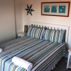 Double bedroom at Aliwal Dive Lodge, South Africa
