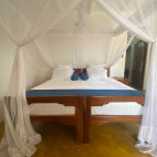 Bedroom at Mafia Kivulini Lodge in Tanzania