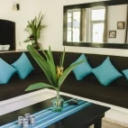 Living room in one of the lodge cabins at Black Rock Lodge, Belize.