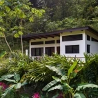 View of a deluxe cabin with Macal river views, at Black Rock Lodge, Belize.