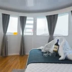 View of the windows in the upper deck honeymoon suite on board Galaxy Diver II, Galápagos.