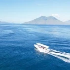 View of a boat heading out from Alor Tanapi Island.