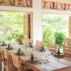 The internal area of the dining terrace at Alor Tanapi Dive Resort.