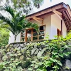 External view of the hillside bungalow at Alor Tanapi Dive Resort. 