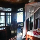 Internal view of a standard oceanfront cottage at Murex Bangka, Indonesia.