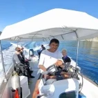 The Tompotika Dive Lodge boat, with divers.