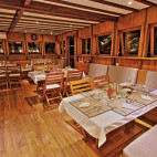 Dining room on board Amira liveaboard in Indonesia
