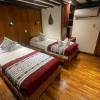 Lower deck twin cabin on board Amira liveaboard in Indonesia