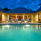 Pool at night at Siddhartha Ocean Front Resort & Spa, Bali.