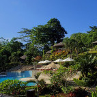 Swimming pool and gardens at Bunaken Oasis Dive Resort & Spa in Indonesia