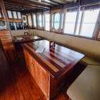 Saloon onboard the Duyung Baru liveaboard in Indonesia