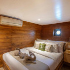 Standard double cabin on board Indo Master liveaboard in Indonesia