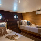 Standard twin cabin on board Indo Master liveaboard in Indonesia