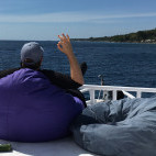 Diver relaxing at Pondok Baruna Garden in Nusa Lembongan, Indonesia.