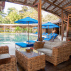 Swimming pool and lounge at Siladen Resort & Spa in Indonesia