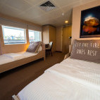 Deluxe twin cabin on board Solitude Adventurer liveaboard in Indonesia