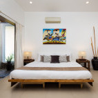 Garden apartment bedroom at Atmosphere Resort & Spa. Holiday accommodation in Dauin, Philippines.