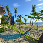 Hammock and beach at Evolution Resort in the Philippines