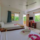 Twin bedroom at Evolution Resort in the Philippines.