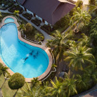 Aerial of divers in swimming pool at Kasai Village Dive Resort in Moalboal, Philippines
