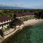 Aerial of the beach and Kasai Village Dive Resort in Moalboal, Philippines