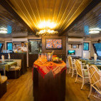 Saloon on board Thailand Aggressor liveaboard.