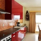 View of the deluxe kitchen at Belmar Oceanfront Apartments, Bonaire.