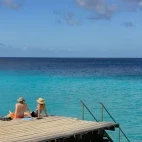Guest enjoying the jetty at Belmar Oceanfront Apartments, Bonaire.