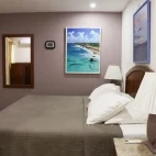 Example of a king-size bedroom at Belmar Oceanfront Apartments, Bonaire.
