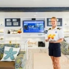 Being greeted by staff in the communal saloon.