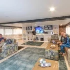 Guest enjoying the saloon on board Bahamas Aggressor II.