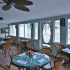 Patio dining at Brac Reef Beach Resort in Grand Cayman, the Cayman Islands