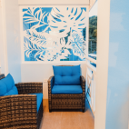 View of the private balcony area off of the standard bedroom at Manta Lodge in Tobago