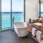 Water villa bathroom at Alila Kothaifaru in the Maldives.