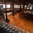 Bar and dining area on board Amba liveaboard in the Maldives