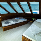 Luxury upper deck cabin on board Amba liveaboard in the Maldives.