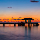 Jetty at sunset, Barefoot Eco Resort in the Maldives.