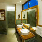 Seaside bathroom at Barefoot Eco Resort in the Maldives.