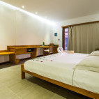 Seaside bedroom at Barefoot Eco Resort in the Maldives.