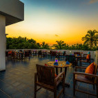 Sunset from the outdoor dining at Boutique Beach Resort on Dhigurah, Maldives