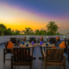 Sunset from the outdoor dining at Boutique Beach Resort on Dhigurah, Maldives