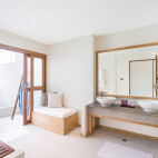 Water bungalow bathroom at Ellaidho Maldives by Cinnamon Resort