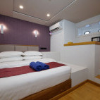 Lower deck double cabin on board Emperor Explorer liveaboard in the Maldives.