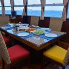 Dining on board Horizon III liveaboard in the Maldives