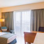 Deluxe bedroom at Barcelo Mussanah, Oman