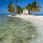 Beach view of Silk Caye, one of three uninhabited islands in Belize.