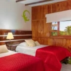 A twin bedroom at Wooden House Lodge, Isabela Island, Galapagos
