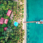 Swimming pool and beach at Hamanasi Resort in Belize
