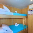 Upper deck twin cabin on board the MY Aqua liveaboard in the Galapagos.